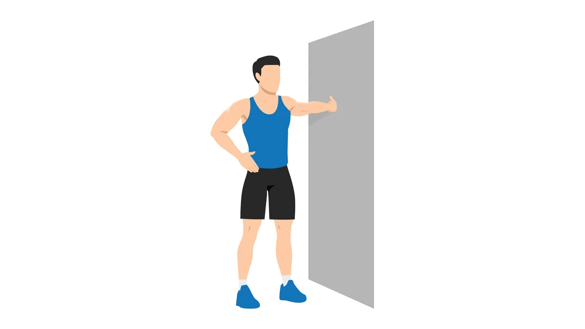 &Eacute;tirement des pectoraux au mur : homme debout, un bras pos&eacute; contre un mur ou l'encadrement d'une porte, tournant le buste dans le sens oppos&eacute; pour ouvrir la poitrine et &eacute;tirer le grand pectoral